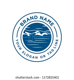 The ship sailing logo designs vector with sunshine, mountains, and ships sailing on water
