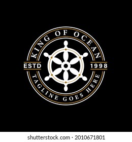Ship steering wheel and anchor logo template. Vector Illustration Isolated with a white and gold circle on a Black Background. Luxury and vintage logo design