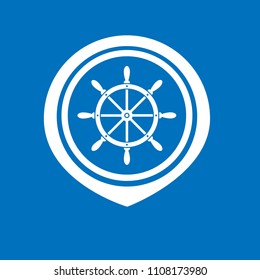 ship steering wheel and map pointer