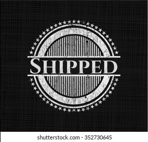Shipped chalkboard emblem on black board