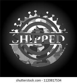 Shipped on grey camouflaged pattern