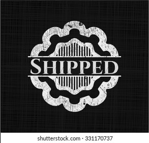 Shipped written on a blackboard