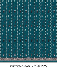 A camisa apresenta um fundo azul-petróleo com padrões verticais listrados de linhas em ziguezague separando pequenos motivos florais e folhas dispostos em colunas repetitivas. Na bainha inferior, há uma borda ornamentada em estilo paisley com acentos marrom-rosados