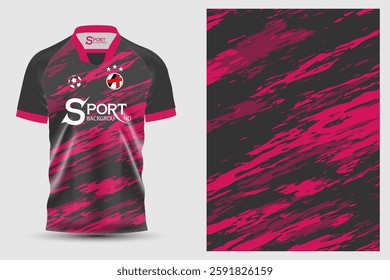 The shirt has a distinctive and modern design using a black base color contrasting with bright pink. There are spray-painted or painted patterns on various areas, giving a sense of movement and energy