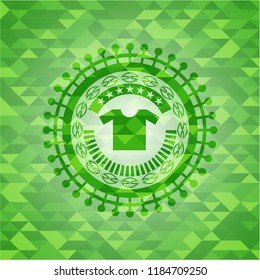 shirt icon inside green emblem with mosaic background