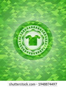 shirt icon inside green emblem. Mosaic background. 