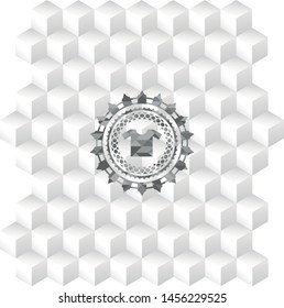 shirt icon inside grey badge with geometric cube white background