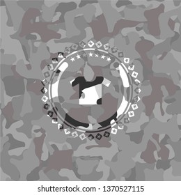 shirt icon inside grey camouflaged emblem
