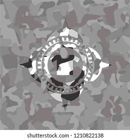 shirt icon on grey camouflaged texture