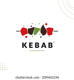 Shish kebab logo design. Skewer of meat with vegetables vector design. Grilled meat skewers logotype, meat logo