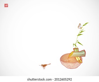 Shishi odoshi water fountain and little bird. Japanese zen garden composition on white  background. Translation of hieroglyph - zen.