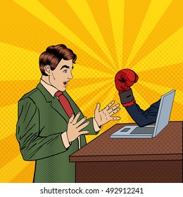 Shocked Business Man with Laptop and Hand in Boxing Glove. Pop Art Vector illustration