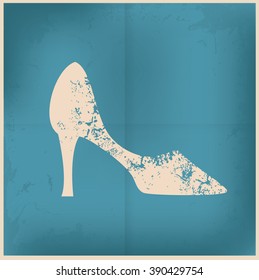 Shoe design on old paper background,vector