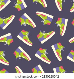 Shoe, footwear. Color high-top sneakers. Seamless pattern. Basketball shoes. Retro style sport shoes. Background. Wallpaper. Lace-up shoes. Colorful Isolated flat drawing vector illustration.