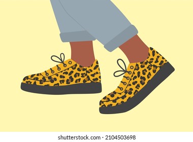 Shoe pair, boots, footwear. Sneakers  shoes. Legs in sneakers with with leopard print and jeans. Fashion glamour style low-top sneakers. Lace-up shoes. Walking. Color Isolated flat vector illustration