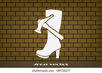 Shoe repair icon vector illustration eps10. Women boots and a hammer to sign the web site or app.