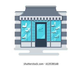 Shoe store. Building in the style of flat shoes in the window with a silhouette of the shoes and says "Shoes"