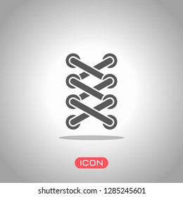 Shoelace of sneaker, simple icon. Icon under spotlight. Gray background