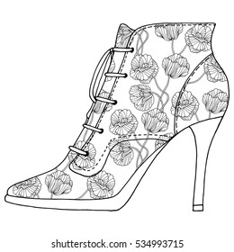 Zapatos con estampado floral. Diseño artístico en línea blanca y negra. Libro de colorantes para adultos.