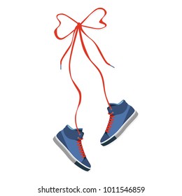 shoes hanging on laces