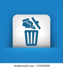 Shoes on trash bin