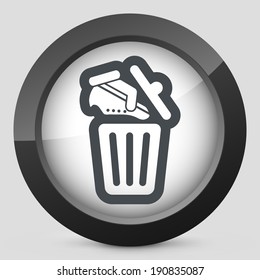 Shoes on trash bin