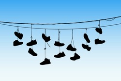 Shoes On Wires. Vector Illustration With Silhouette Of Old Shoes Hanging On Power Lines. Blue Pastel Background
