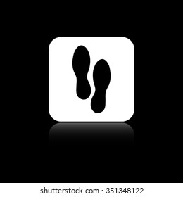 Shoes prints - black vector icon on the white button