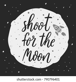 Shoot for the Moon.  Inspirational and motivational quote. Hand drawn lettering script. Rocket vector illustration. Hand drawn lettering quote about motivational and achievement of the goal.