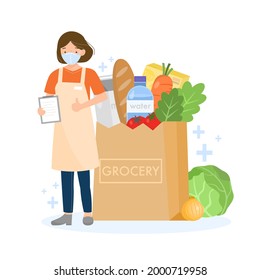 Shop assistant girl wearing face mask covering in grocery store with paper shopping bag with fresh vegetable, fruits, dairy and drinks. Safty measurements for customer to protect from Coronavirus.