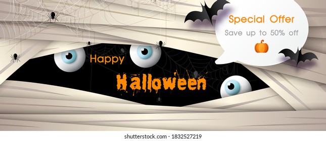 Shop banner and advertising with bats flying and Happy Halloween letters on face of giant evil background. All in banner and vector design.