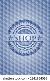 Shop blue emblem or badge with abstract geometric pattern background.