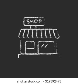 Shop hand drawn in chalk on a blackboard vector white icon isolated on a black background.