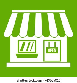 Shop icon white isolated on green background. Vector illustration