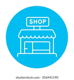 Shop line icon for web, mobile and infographics. Vector white icon on the light blue circle isolated on white background.