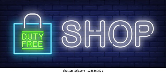 Shop neon sign. Glowing inscription with duty free paper bag on brick wall background. Can be used for airport, shopping, duty free zone