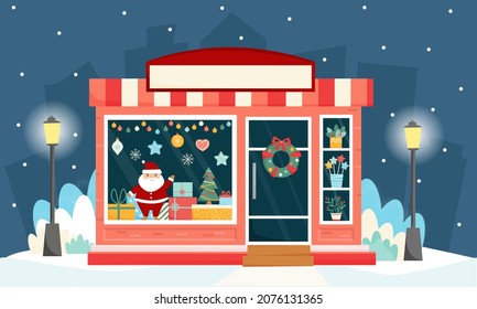 Shop window. Gifts shop with Christmas decoration at night time. Christmas shop window with gifts. Christmas gifts, Christmas market. Banner for New Year.