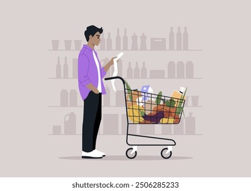 A shopper reviews their grocery list, standing beside a cart overflowing with items in a well-organized store setting