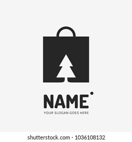 Shopping bag and christmas tree. Vector logo design. Business concept icon.