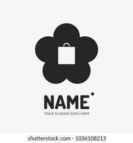 Shopping bag and flower. Vector logo design. Business concept icon.