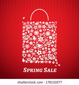 Shopping bag made of flowers on red striped background. For Spring Sale