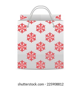 Shopping bag with a pattern of snowflakes isolated on a white background