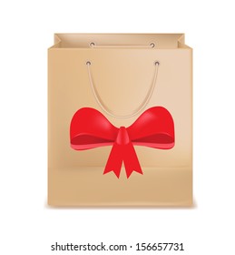 shopping bag and red bow isolated on white background