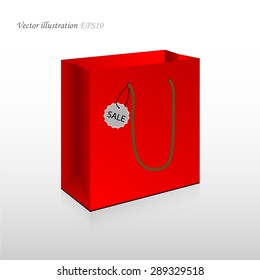 Shopping bag with sale label.