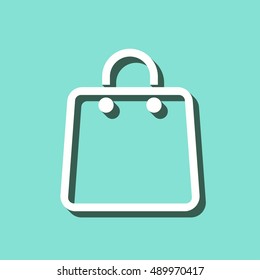 Shopping bag vector icon with shadow. White illustration isolated on green background for graphic and web design.