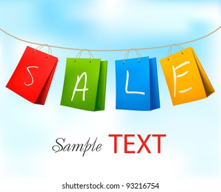 Shopping bags hanging on a rope with SALE on them. Concept of discount. Vector illustration.