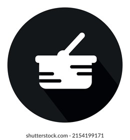 Icono de la canasta de compras con sombra larga sobre el fondo.