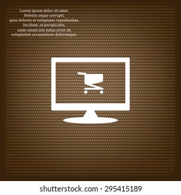Shopping basket icon on computer screen.