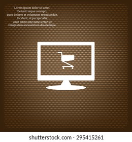 Shopping basket icon on computer screen.