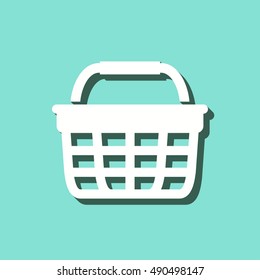 Shopping basket vector icon with shadow. White illustration isolated on green background for graphic and web design.